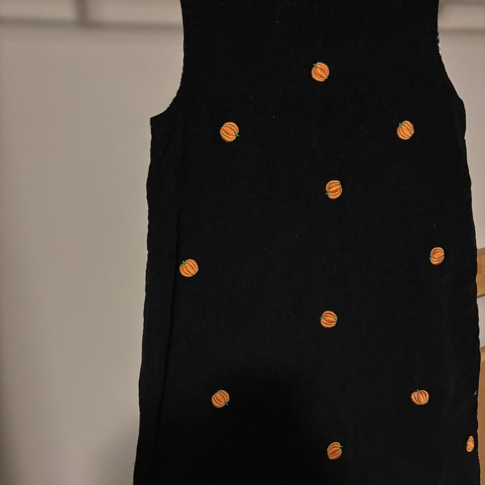 Charming Black Dress with Orange Pumpkin Accents